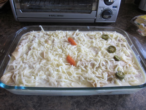 Pan of white enchilladas before going in the oven